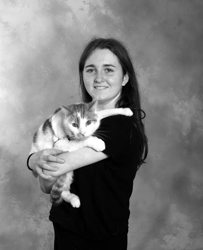 Beautiful Girl Holding a Cat